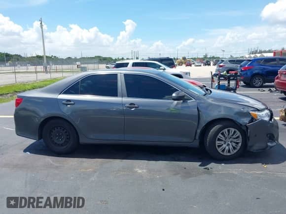 2012 Toyota Camry L z VIN 4T1BF1FK5CU629140, wystawiony jako IAAI lot #42885614 z przebiegiem 94 732 mil mil oraz . Historia ofert i sprzedaży dostępna na DreamBid. Obrazek 13.