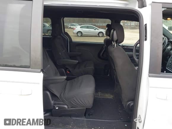 2016 Dodge Grand Caravan American Value z VIN 2C4RDGBG6GR176243, wystawiony jako IAAI lot #41742550 z przebiegiem 116 945 mil mil oraz . Historia ofert i sprzedaży dostępna na DreamBid. Obrazek 8.
