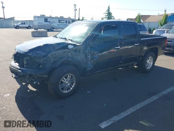 2011 Chevrolet Colorado 1LT z VIN 1GCHTCFE2B8115945, wystawiony jako IAAI lot #42314389 z przebiegiem 250 571 mil mil oraz . Historia ofert i sprzedaży dostępna na DreamBid. Obrazek 2.