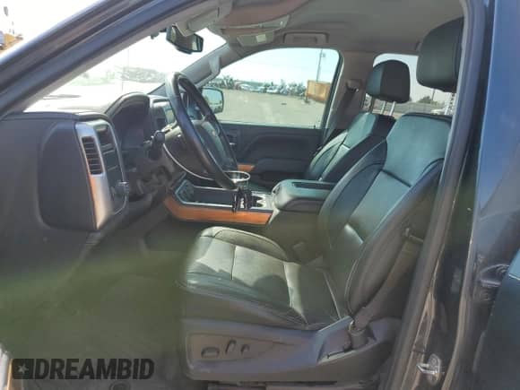 2018 Chevrolet Silverado 1500 LTZ with VIN 3GCPCSEC0JG114937, listed as a Copart auction lot 84410245 with 181,575 mi miles and Salvage title. Bid and sale history available at DreamBid. Image 7.