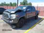 2022 Toyota Tacoma SR5 with VIN 3TMAZ5CN2NM174087, listed as a IAAI auction lot 43204600 with 68,360 mi miles and . Bid and sale history available at DreamBid. Image 2.