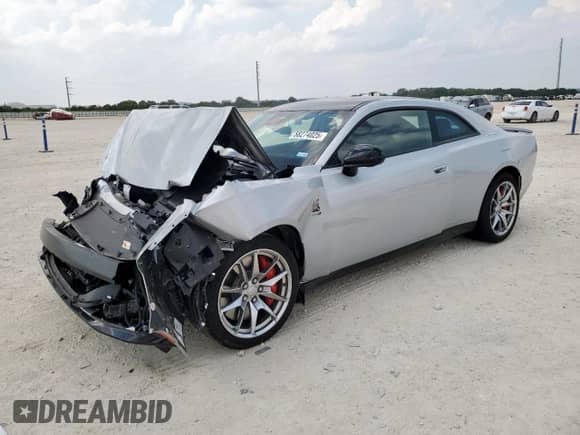 2024 Dodge Charger Scat Pack с VIN 2C3CDBDK6RR208111, выставлен на аукционе Copart как лот 58274025 с пробегом 962 миль миль и Списание • Salvage title. История ставок и продаж доступна на DreamBid. Изображение 1.