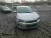 2014 Chevrolet Sonic LTZ with VIN 1G1JE5SB4E4201684, listed as a Copart auction lot 43089345 with 161,948 mi miles and Salvage title. Bid and sale history available at DreamBid. Image 10.