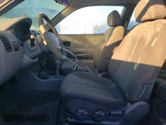 2004 Hyundai Accent GL z VIN KMHCG35C44U284868, wystawiony jako Copart lot #74054884 z przebiegiem 87 259 mil mil oraz Czysty tytuł • Clean title. Historia ofert i sprzedaży dostępna na DreamBid. Obrazek 7.