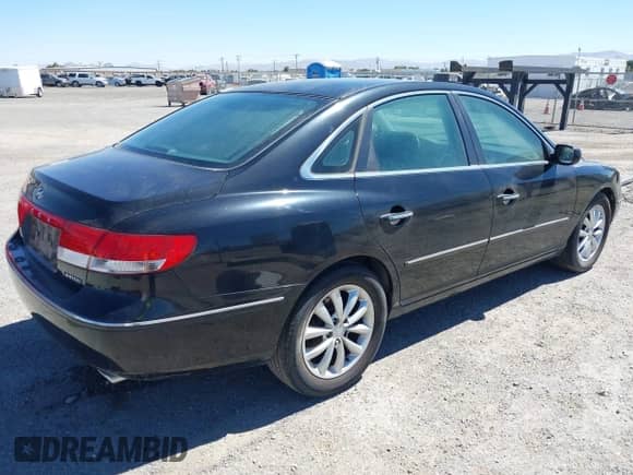 2006 Hyundai Azera SE with VIN KMHFC46FX6A042615, listed as a IAAI auction lot 42888424 with 142,847 mi miles and . Bid and sale history available at DreamBid. Image 4.