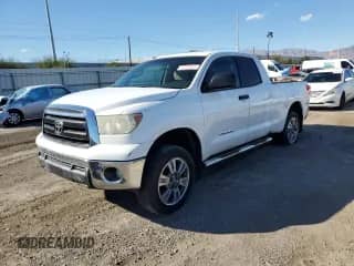 2012 Toyota Tundra с VIN 5TFRM5F15CX046296, выставлен на аукционе Copart как лот 83764565 с пробегом 129 264 миль миль и Списание • Salvage title. История ставок и продаж доступна на DreamBid. Изображение 1.