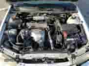 1999 Toyota Camry LE z VIN JT2BG22K4X0378940, wystawiony jako Copart lot #69477874 z przebiegiem 255 052 mil mil oraz Szkoda całkowita • Salvage title. Historia ofert i sprzedaży dostępna na DreamBid. Obrazek 11.