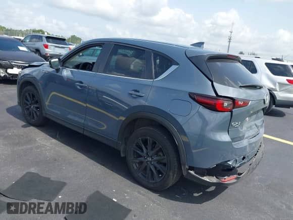 2023 Mazda CX-5 S Carbon Edition z VIN JM3KFBCM6P0171807, wystawiony jako IAAI lot #42450088 z przebiegiem 40 146 mil mil oraz . Historia ofert i sprzedaży dostępna na DreamBid. Obrazek 3.