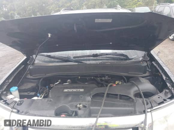 2010 Honda Pilot Touring with VIN 5FNYF4H84AB011640, listed as a IAAI auction lot 43037958 with 155,985 mi miles and . Bid and sale history available at DreamBid. Image 10.