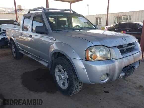 2003 Nissan Frontier SVE with VIN 1N6MD29Y63C465571, listed as a IAAI auction lot 41502613 with 175,996 mi miles and . Bid and sale history available at DreamBid. Image 1.