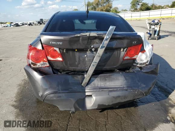 2014 Chevrolet Cruze 2LT z VIN 1G1PE5SB4E7224245, wystawiony jako Copart lot #85126455 z przebiegiem 141 316 mil mil oraz Szkoda całkowita • Salvage title. Historia ofert i sprzedaży dostępna na DreamBid. Obrazek 6.