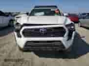 2024 Toyota Tacoma SR5 with VIN 3TMLB5JN4RM050957, listed as a Copart auction lot 71130595 with 1,873 mi miles and Salvage title. Bid and sale history available at DreamBid. Image 5.