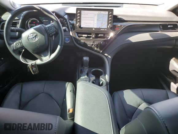 2023 Toyota Camry Hybrid XSE с VIN 4T1K31AKXPU609407, выставлен на аукционе Copart как лот 66486835 с пробегом 26 892 миль миль и Списание • Salvage title. История ставок и продаж доступна на DreamBid. Изображение 8.