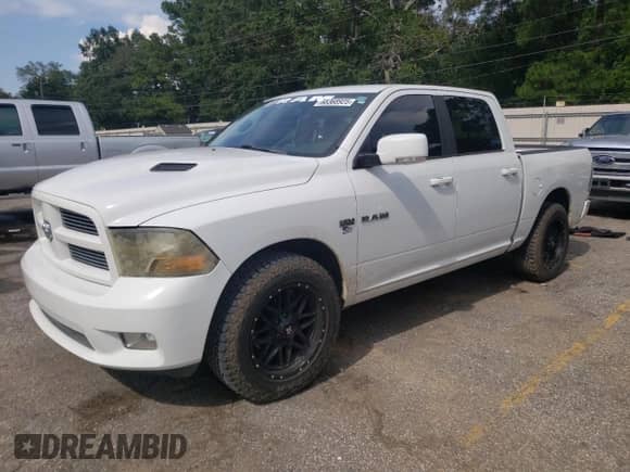 2010 Dodge 1500 SLT with VIN 1D7RB1CT2AS185502, listed as a Copart auction lot 68368925 with 151,747 mi miles and Salvage title. Bid and sale history available at DreamBid. Image 1.