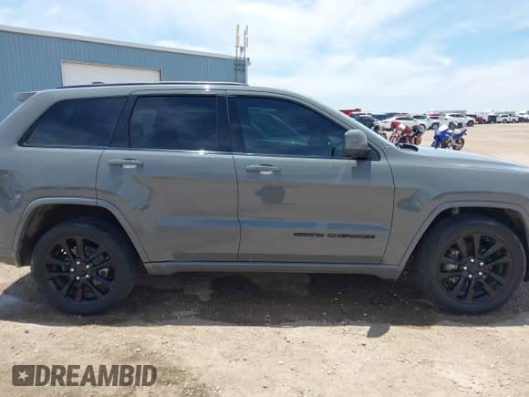 2019 Jeep Grand Cherokee Altitude with VIN 1C4RJFAG0KC670071, listed as a IAAI auction lot 42442245 with 101,867 mi miles and . Bid and sale history available at DreamBid. Image 13.