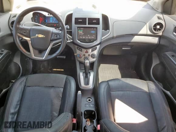 2013 Chevrolet Sonic LTZ с VIN 1G1JE6SB4D4164608, выставлен на аукционе Copart как лот 72056885 с пробегом 144 155 миль миль и Списание • Salvage title. История ставок и продаж доступна на DreamBid. Изображение 8.