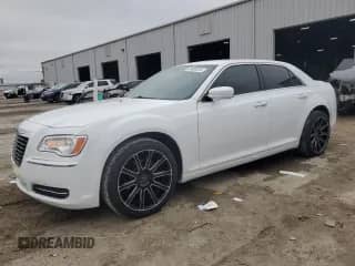 2014 Chrysler 300 с VIN 2C3CCAAG2EH327089, выставлен на аукционе Copart как лот 89683815 с пробегом 131 403 миль миль и Списание • Salvage title. История ставок и продаж доступна на DreamBid. Изображение 1.