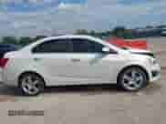 2014 Chevrolet Sonic LTZ with VIN 1G1JE5SB2E4212067, listed as a IAAI auction lot 43471089 with 97,581 mi miles and . Bid and sale history available at DreamBid. Image 13.