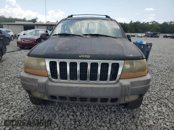 1999 Jeep Grand Cherokee Laredo с VIN 1J4G258S4XC577449, выставлен на аукционе Copart как лот 66556115 с пробегом 220 256 миль миль и Чистый • Clean title. История ставок и продаж доступна на DreamBid. Изображение 5.