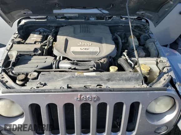 2014 Jeep Wrangler Rubicon with VIN 1C4BJWCG7EL206665, listed as a Copart auction lot 86903384 with 413,442 mi miles and Salvage title. Bid and sale history available at DreamBid. Image 11.