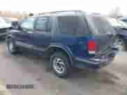 1999 Chevrolet Blazer LS z VIN 1GNDT13W0X2223207, wystawiony jako IAAI lot #41352241 z przebiegiem 239 263 mil mil oraz . Historia ofert i sprzedaży dostępna na DreamBid. Obrazek 3.