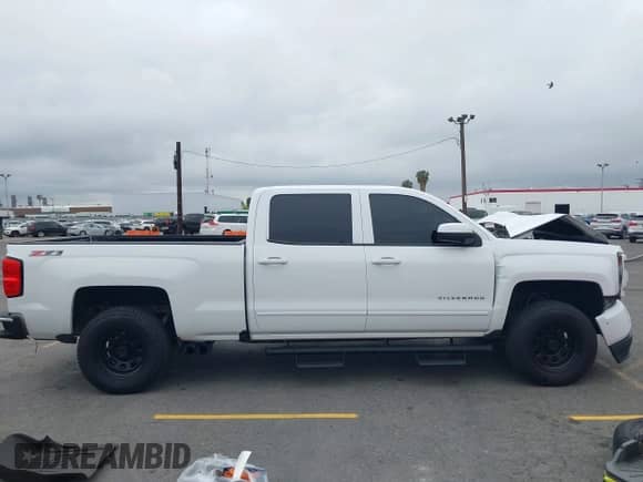 2017 Chevrolet Silverado 1500 LT с VIN 1GCUKRECXHF219494, выставлен на аукционе IAAI как лот 42068897 с пробегом 102 812 миль миль и . История ставок и продаж доступна на DreamBid. Изображение 13.