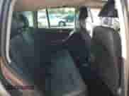 2013 Volkswagen Tiguan SE z VIN WVGAV3AXXDW606925, wystawiony jako Copart lot #64238585 z przebiegiem 131 779 mil mil oraz Szkoda całkowita • Salvage title. Historia ofert i sprzedaży dostępna na DreamBid. Obrazek 11.