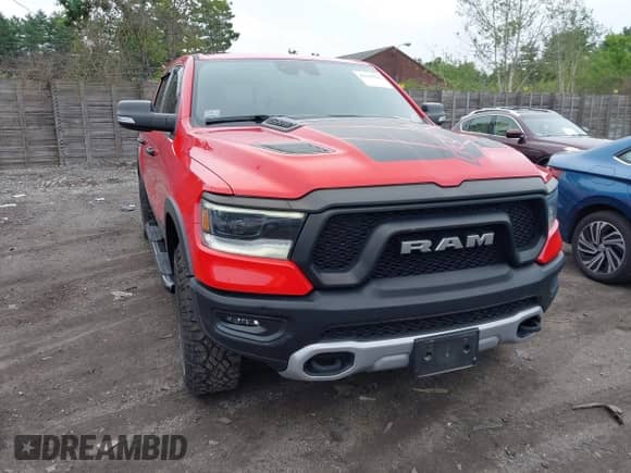 2022 Ram 1500 Rebel z VIN 1C6SRFLT1NN183823, wystawiony jako IAAI lot #42639735 z przebiegiem 36 048 mil mil oraz . Historia ofert i sprzedaży dostępna na DreamBid. Obrazek 12.