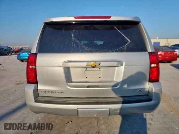 2018 Chevrolet Suburban LT with VIN 1GNSKHKC2JR150494, listed as a Copart auction lot 86105505 with 64,659 mi miles and Salvage title. Bid and sale history available at DreamBid. Image 6.