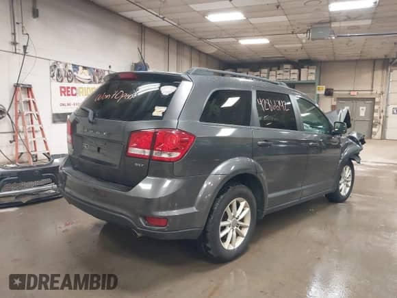 2017 Dodge Journey SXT with VIN 3C4PDDBG3HT512659, listed as a IAAI auction lot 42866742 with Not provided miles and . Bid and sale history available at DreamBid. Image 4.