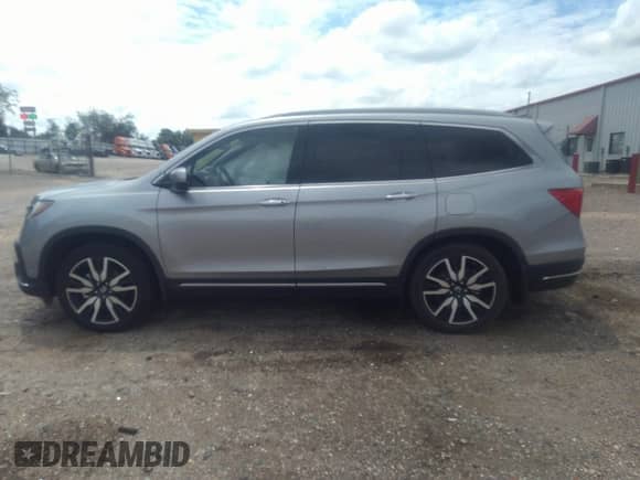 2020 Honda Pilot Touring 8-Passenger с VIN 5FNYF5H9XLB019372, выставлен на аукционе IAAI как лот 39672588 с пробегом 71 889 миль миль и . История ставок и продаж доступна на DreamBid. Изображение 14.