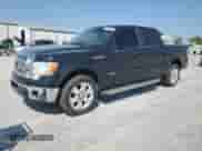 2012 Ford F-150 XL with VIN 1FTFW1CTXCFC95646, listed as a Copart auction lot 71909435 with 302,033 mi miles and Salvage title. Bid and sale history available at DreamBid. Image 1.