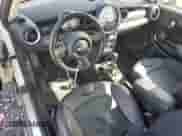 2011 MINI Hardtop S with VIN WMWSV3C50BTY15977, listed as a Copart auction lot 52802295 with 89,085 mi miles and Salvage title. Bid and sale history available at DreamBid. Image 8.