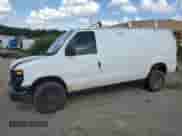 2014 Ford Econoline Cargo Commercial with VIN 1FTNE2EWXEDA07635, listed as a Copart auction lot 61407115 with 205,068 mi miles and Salvage title. Bid and sale history available at DreamBid. Image 1.