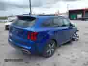 2023 Kia Sorento EX with VIN 5XYRH4LF6PG200313, listed as a IAAI auction lot 42635362 with 27,009 mi miles and . Bid and sale history available at DreamBid. Image 4.