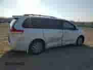 2012 Toyota Sienna XLE AAS with VIN 5TDYK3DC3CS198576, listed as a Copart auction lot 80911565 with 95,740 mi miles and Salvage title. Bid and sale history available at DreamBid. Image 3.