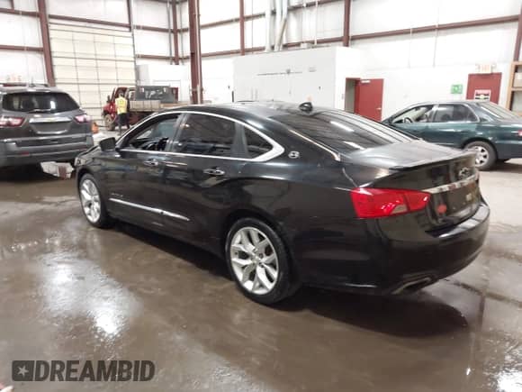 2014 Chevrolet Impala LTZ with VIN 1G1145SLXEU149313, listed as a IAAI auction lot 42386535 with 153,304 mi miles and . Bid and sale history available at DreamBid. Image 3.