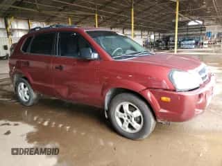 2006 Hyundai Tucson GL with VIN KM8JM12B86U435570, listed as a Copart auction lot 82398565 with 81,243 mi miles and Salvage title. Bid and sale history available at DreamBid. Image 4.