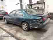 1997 Toyota Camry LE z VIN 4T1BF22K5VU903726, wystawiony jako IAAI lot #41552016 z przebiegiem 121 079 mil mil oraz . Historia ofert i sprzedaży dostępna na DreamBid. Obrazek 3.