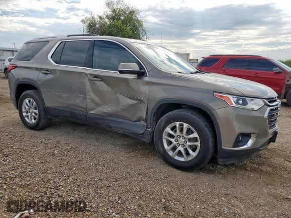 2018 Chevrolet Traverse LT Cloth с VIN 1GNERGKW5JJ193027, выставлен на аукционе Copart как лот 82346745 с пробегом 77 221 миль миль и Списание • Salvage title. История ставок и продаж доступна на DreamBid. Изображение 4.