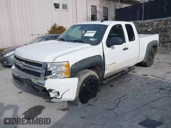 2007 Chevrolet Silverado 1500 1LT z VIN 2GCEK19J671724422, wystawiony jako IAAI lot #41277843 z przebiegiem 111 802 mil mil oraz . Historia ofert i sprzedaży dostępna na DreamBid. Obrazek 17.
