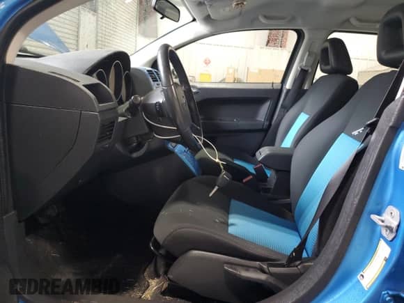 2009 Dodge Caliber SXT z VIN 1B3HB48A79D180120, wystawiony jako Copart lot #82015045 z przebiegiem 76 788 mil mil oraz Czysty tytuł • Clean title. Historia ofert i sprzedaży dostępna na DreamBid. Obrazek 7.