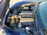 2006 Chevrolet Corvette with VIN 1G1YY26U965130817, listed as a Copart auction lot 76907154 with 98,280 mi miles and Salvage title. Bid and sale history available at DreamBid. Image 11.