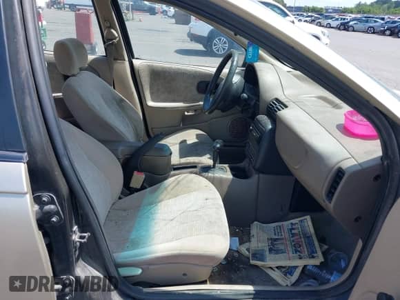 1999 Saturn SL z VIN 1G8ZK5275XZ283178, wystawiony jako IAAI lot #42303549 z przebiegiem 216 776 mil mil oraz . Historia ofert i sprzedaży dostępna na DreamBid. Obrazek 5.