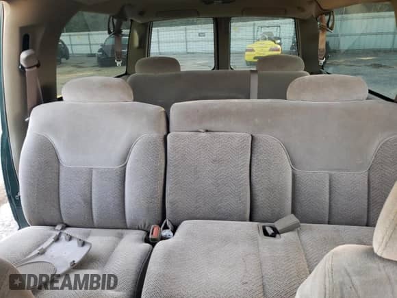 1997 Chevrolet Suburban z VIN 3GNEC16R6VG167319, wystawiony jako Copart lot #77485194 z przebiegiem 188 479 mil mil oraz Szkoda całkowita • Salvage title. Historia ofert i sprzedaży dostępna na DreamBid. Obrazek 10.