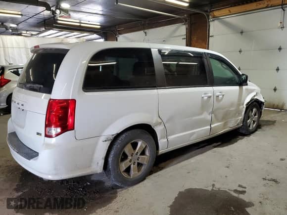 2018 Dodge Grand Caravan SE Plus with VIN 2C4RDGBG3JR129811, listed as a Copart auction lot 71648825 with 187,259 mi miles and Salvage title. Bid and sale history available at DreamBid. Image 3.