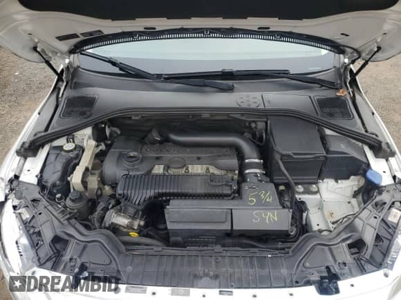 2015 Volvo S60 T5 Premier z VIN YV1612TBXF1310718, wystawiony jako Copart lot #67234645 z przebiegiem 151 555 mil mil oraz Szkoda całkowita • Salvage title. Historia ofert i sprzedaży dostępna na DreamBid. Obrazek 11.