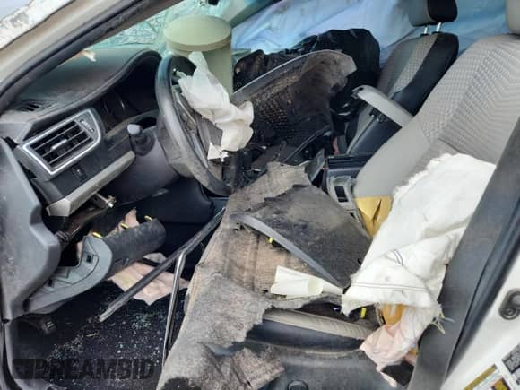 2015 Toyota Camry LE с VIN 4T1BD1FK1FU175186, выставлен на аукционе Copart как лот 69825435 с пробегом Не указан миль и Списание • Salvage title. История ставок и продаж доступна на DreamBid. Изображение 7.