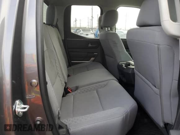 2023 Toyota Tundra SR5 с VIN 5TFLA5DA2PX119857, выставлен на аукционе Copart как лот 67063925 с пробегом 8 600 миль миль и Списание • Salvage title. История ставок и продаж доступна на DreamBid. Изображение 10.