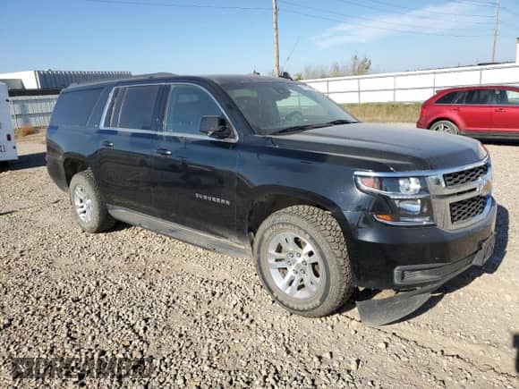 2019 Chevrolet Suburban LT with VIN 1GNSKHKC8KR365301, listed as a Copart auction lot 82156775 with 409,152 mi miles and Clean title. Bid and sale history available at DreamBid. Image 4.